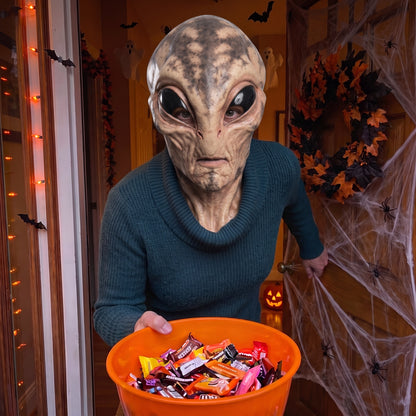 Spotted-Skin Alien latex mask worn at a Halloween front door