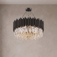 Noctis black crystal drum chandelier on a warm light grey studio background