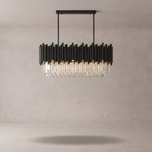 Noctis black crystal linear pendant on a warm light grey studio background