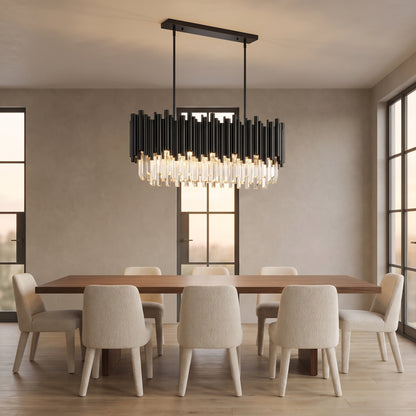 Noctis black crystal linear pendant above a long walnut dining table