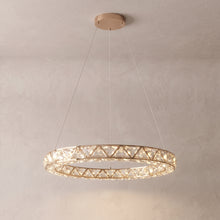 Noor rose gold crystal ring chandelier on a warm light grey studio background