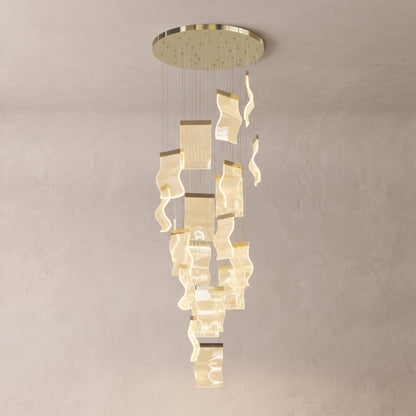 Nyra cascading chandelier on a warm light grey studio background