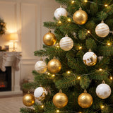 gold and white ornaments hanging in a Christmas tree