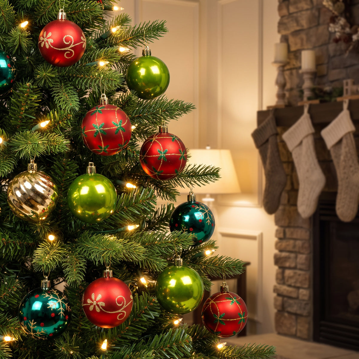 red, green and gold ornaments hanging in a Christmas tree