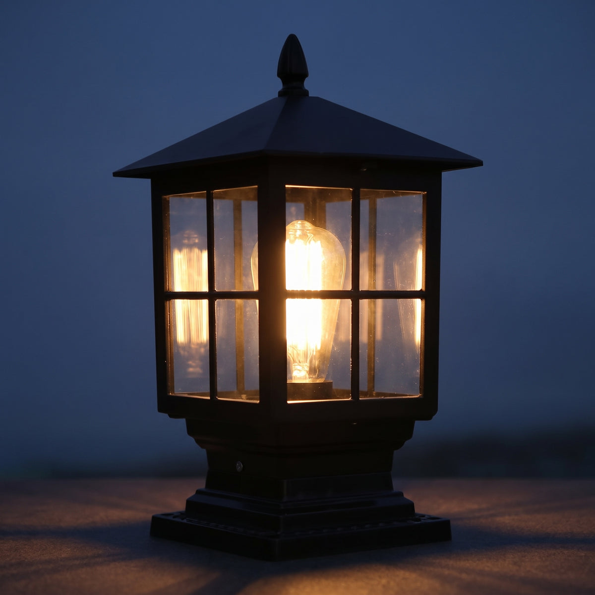 Ironwood solar post light at night — lights on