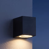 Kaku outdoor wall washer light at night — lights on