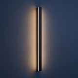 Marlow outdoor wall light at night — lights on