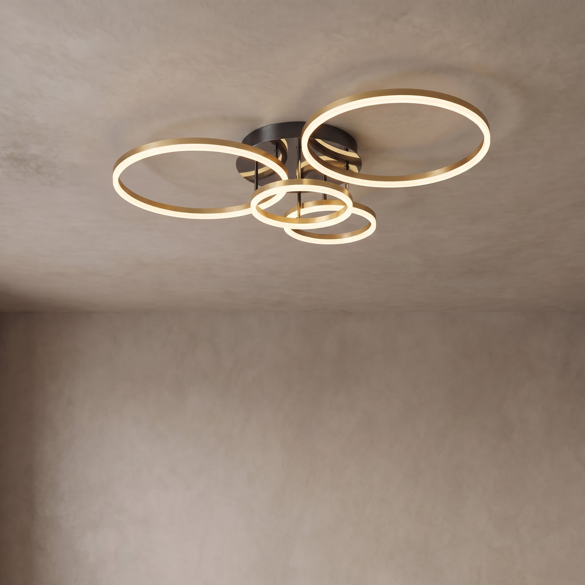 Ondine circle ring ceiling light close-up in metallic gold with 5 rings