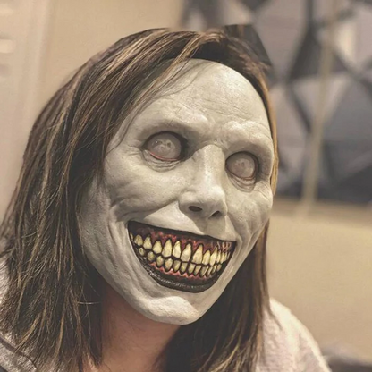Creepy smiling evil-face mask, product photo