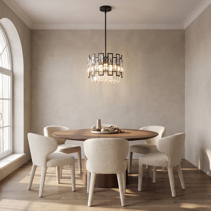 Raven mini crystal pendant above a round walnut dining table