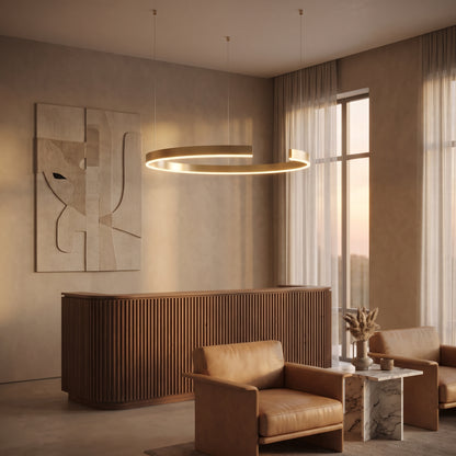 Gold-plated ring chandelier in a boutique hotel lobby