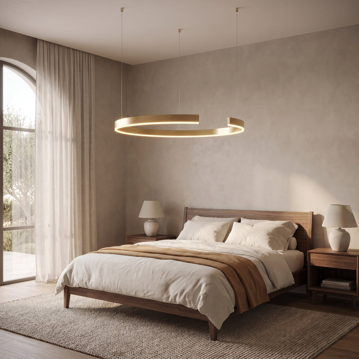 Gold-plated ring chandelier, medium size, above the foot of a walnut bed