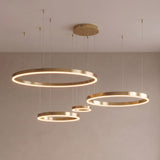 Rosalind tiered ring chandelier close-up in gold with 4 rings
