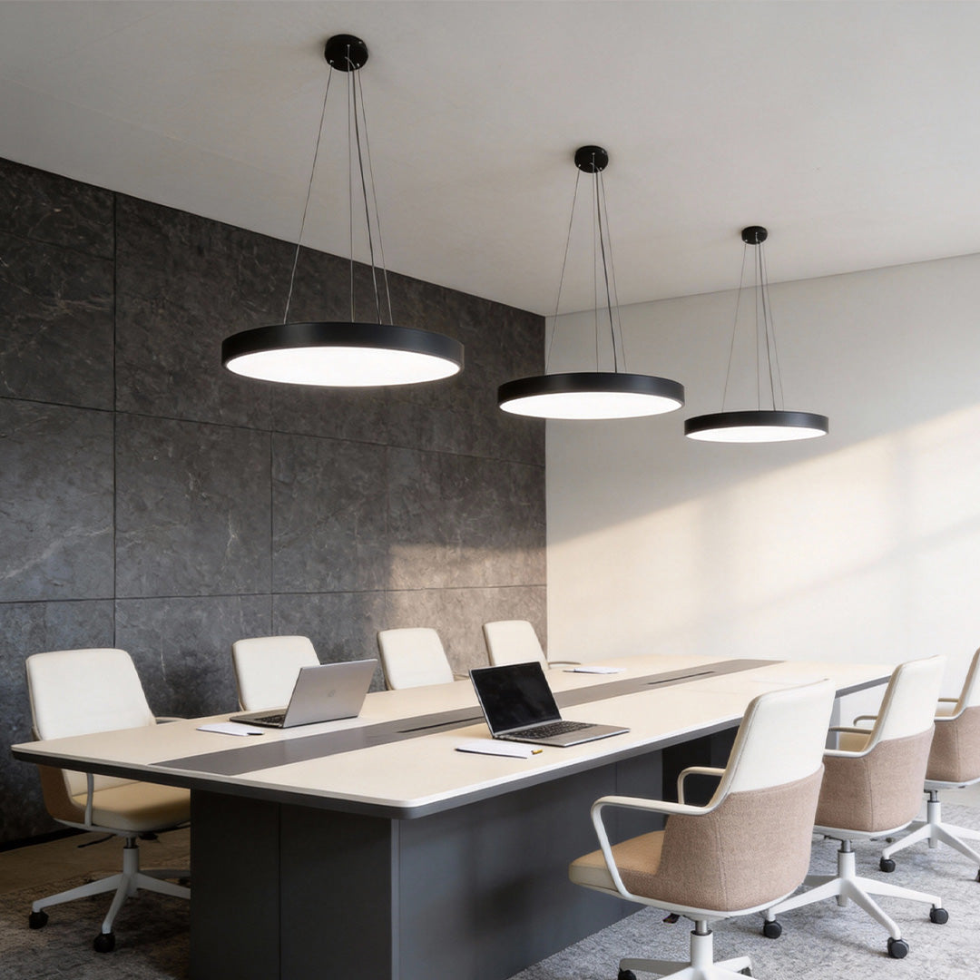 Round pendant light in black and white finishes