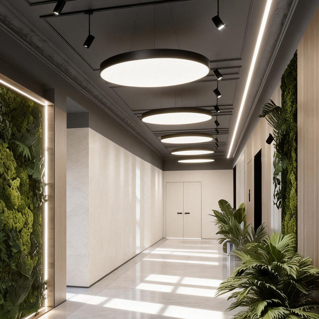 Round pendant light illuminated in a meeting room