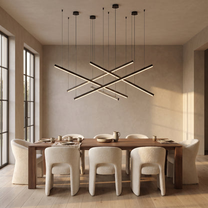 Rowan linear chandelier above a long walnut dining table