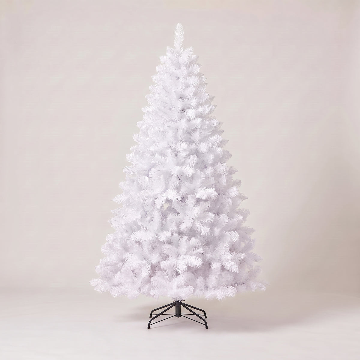 White artificial Christmas tree, studio photo