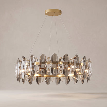 Seren smoky grey crystal chandelier on a warm light grey studio background