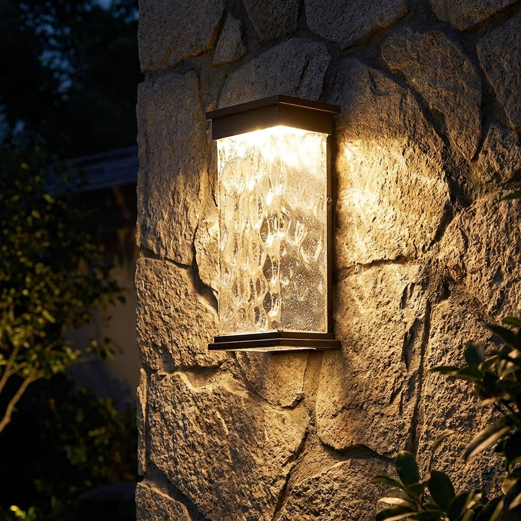 Shio - mounted on stone wall at night
