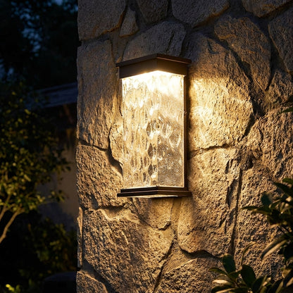 Shio - mounted on stone wall at night