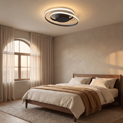 Linnea spiral LED ceiling light, small size, in a bedroom