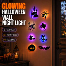 Halloween wall stickers glowing softly on a bedroom wall at night