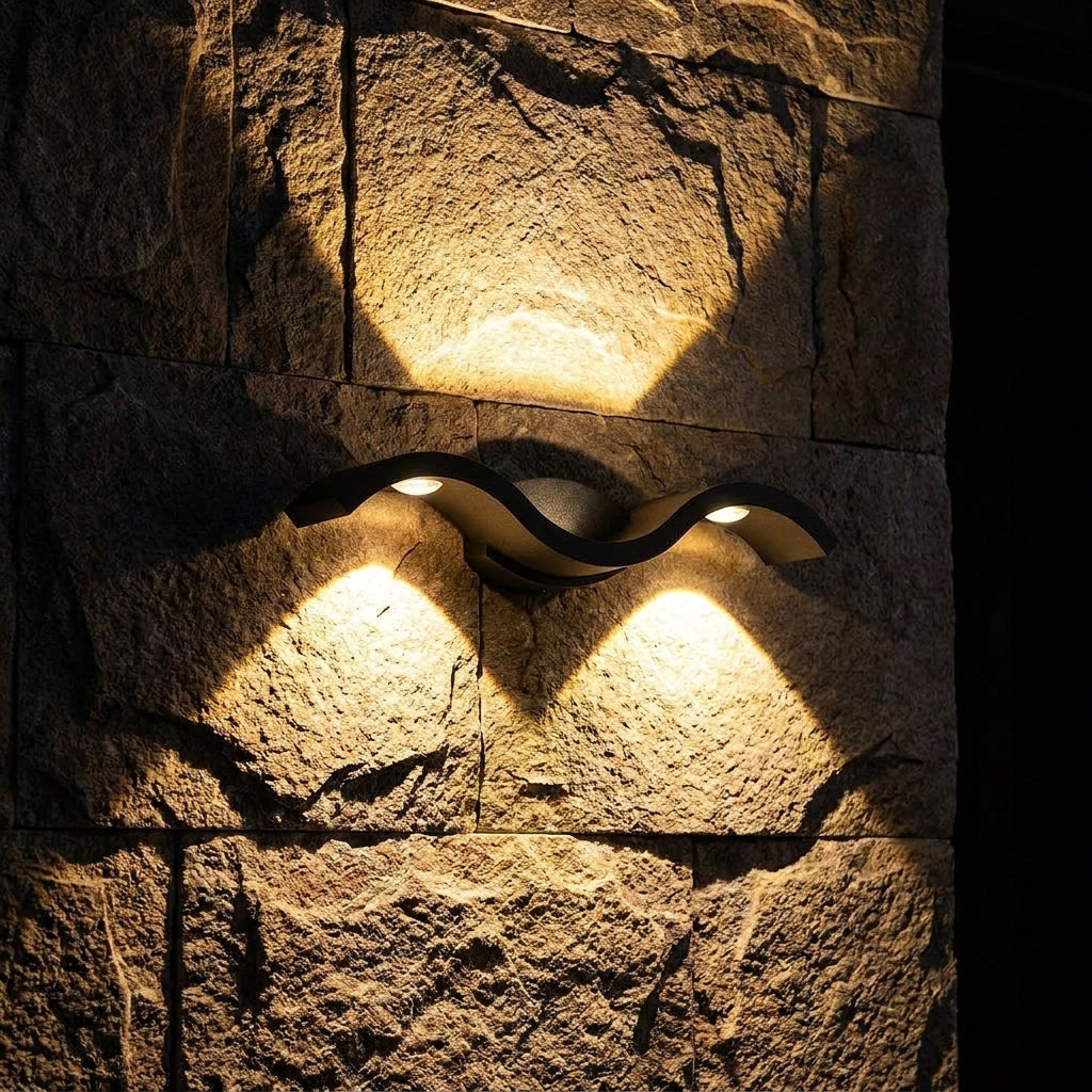 Undertow - mounted on stone wall at night