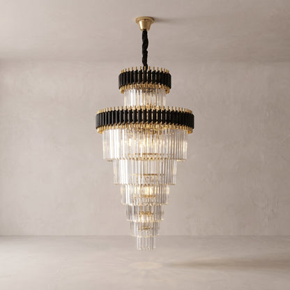 Vesper spiral crystal chandelier on a warm light grey studio background