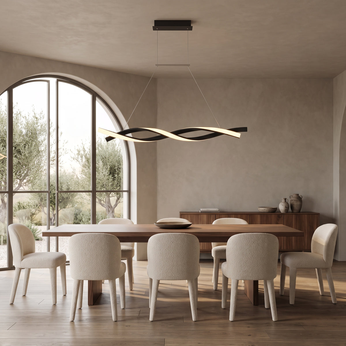 Ondine linear wave LED pendant above a long walnut dining table