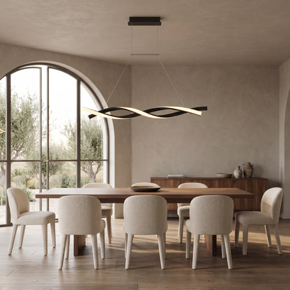 Ondine linear wave LED pendant above a long walnut dining table
