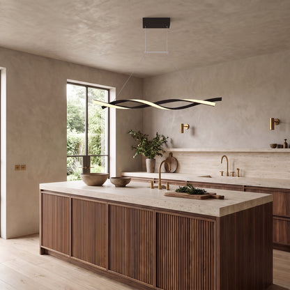 Ondine linear wave LED pendant above a walnut kitchen island