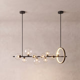 Wren linear glass globe chandelier on a warm light grey studio background