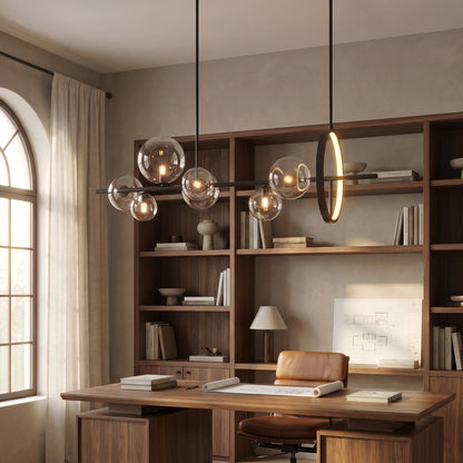 Wren linear glass globe chandelier above a walnut desk in a home office