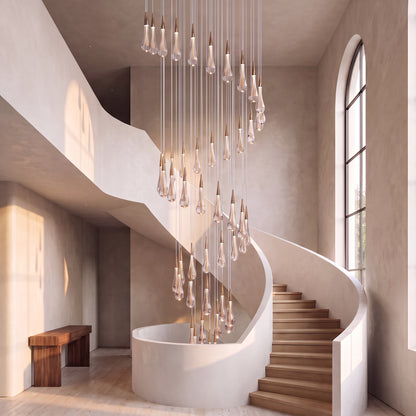 Zephyra spiral crystal chandelier cascading in a double-height stairwell